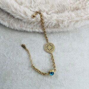 Anthropologie Gold Bracelet with Blue Evil Eye Accent